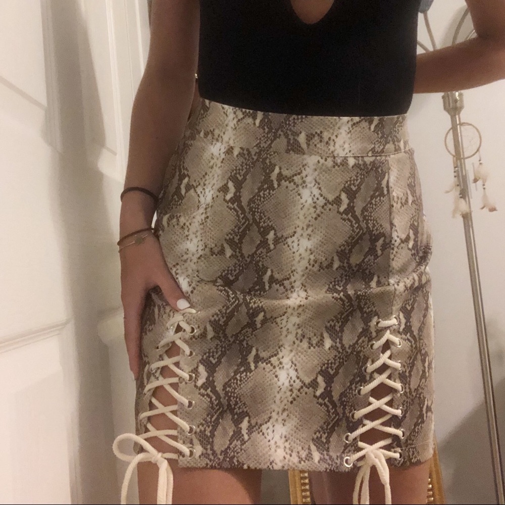 Snake print lace up skirt